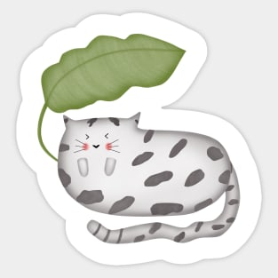 Cute cat sleeping under banana leaf Sticker